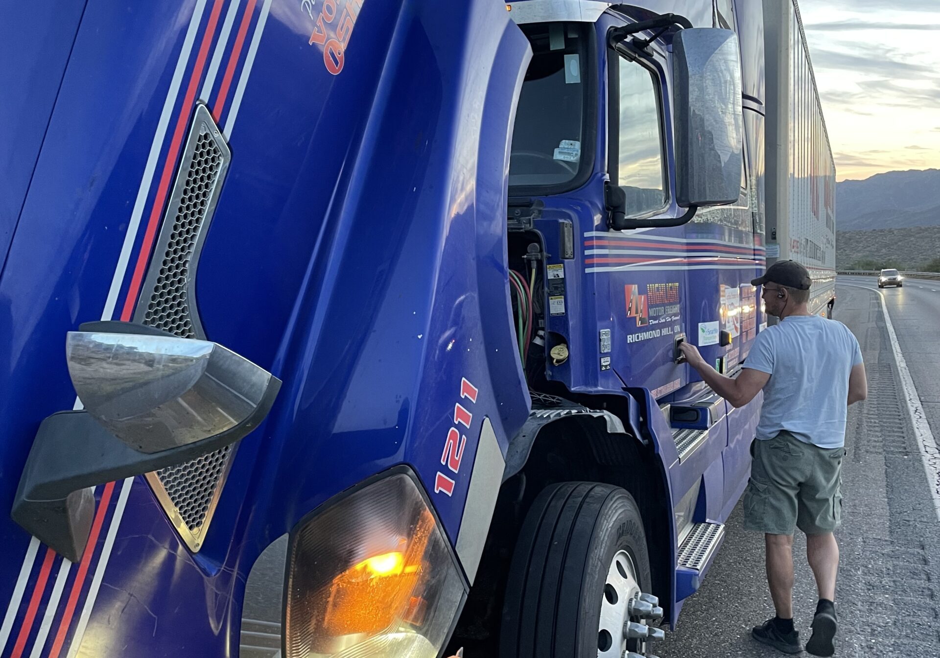 Professional mechanic performing mobile truck repair in Phoenix, AZ.